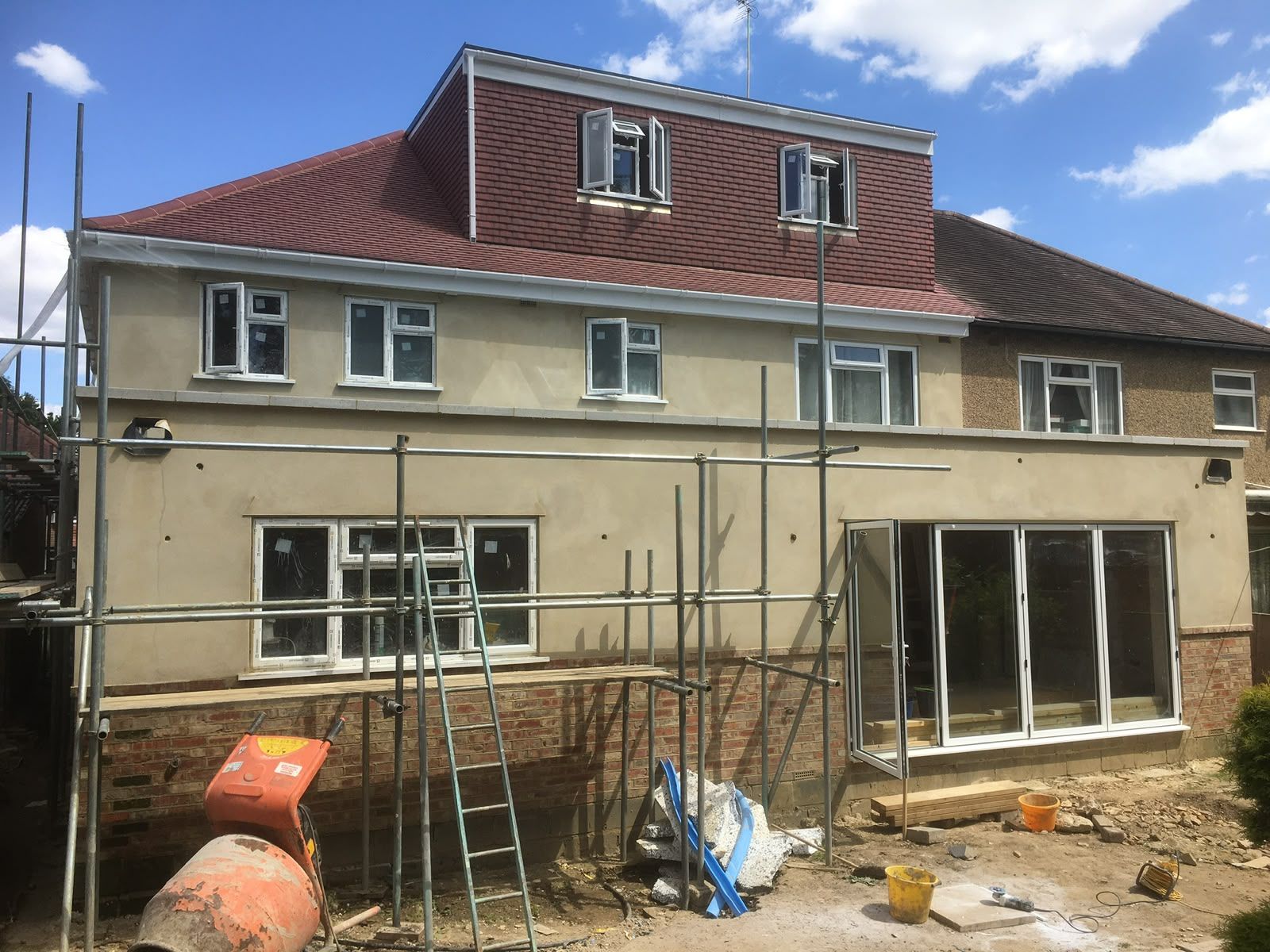 Double storey rear extension with loft dormer and bifold doors