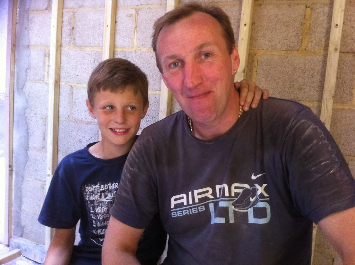Father and son on site during a build in Croydon